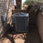 carrier hvac split system outside a home