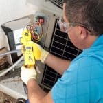 Temco hvac technician working on a unit